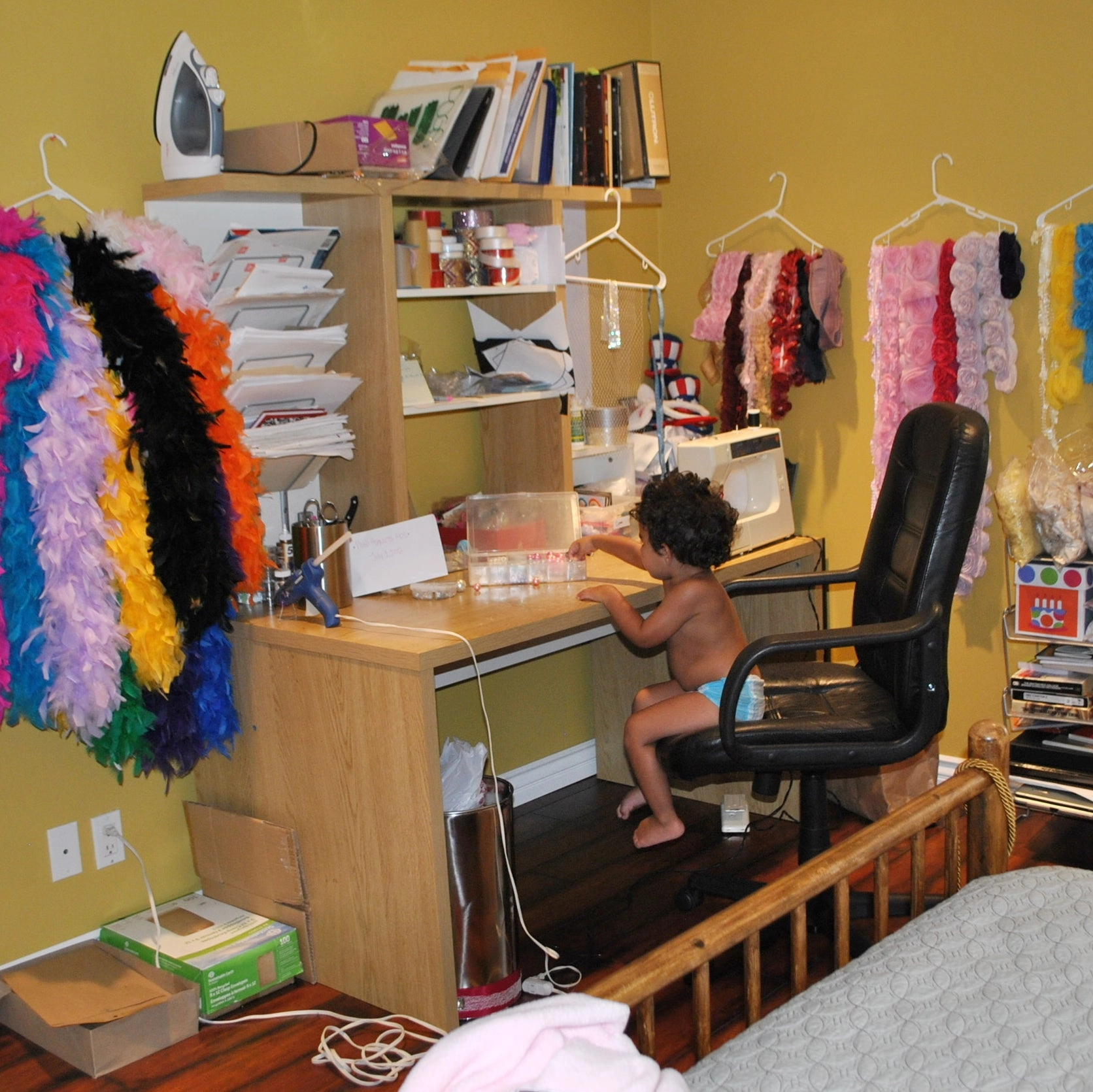 Office with desk, books, boas and baby